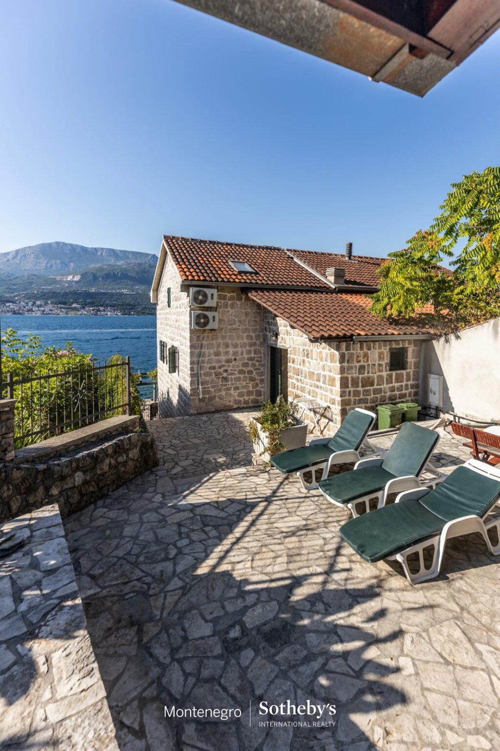 Charming Waterfront Stone House