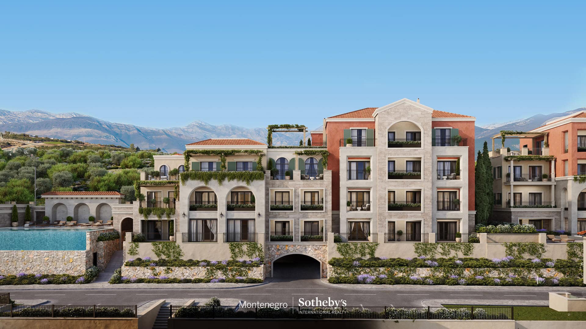 Luxury real estate Montenegro: modern residential building with mountain view.
