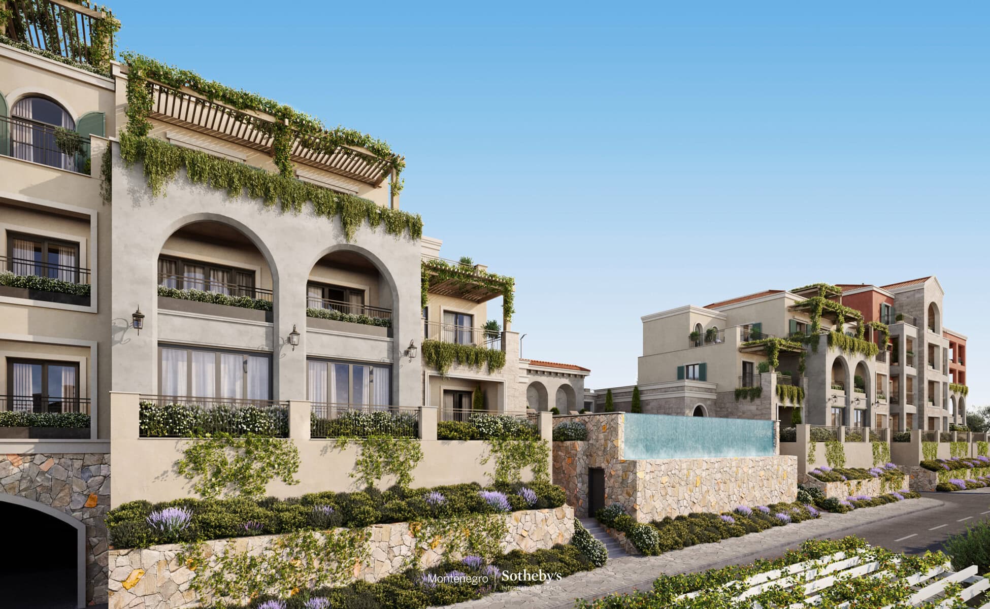 Luxury real estate Montenegro: modern hillside apartments with lush greenery and scenic views.